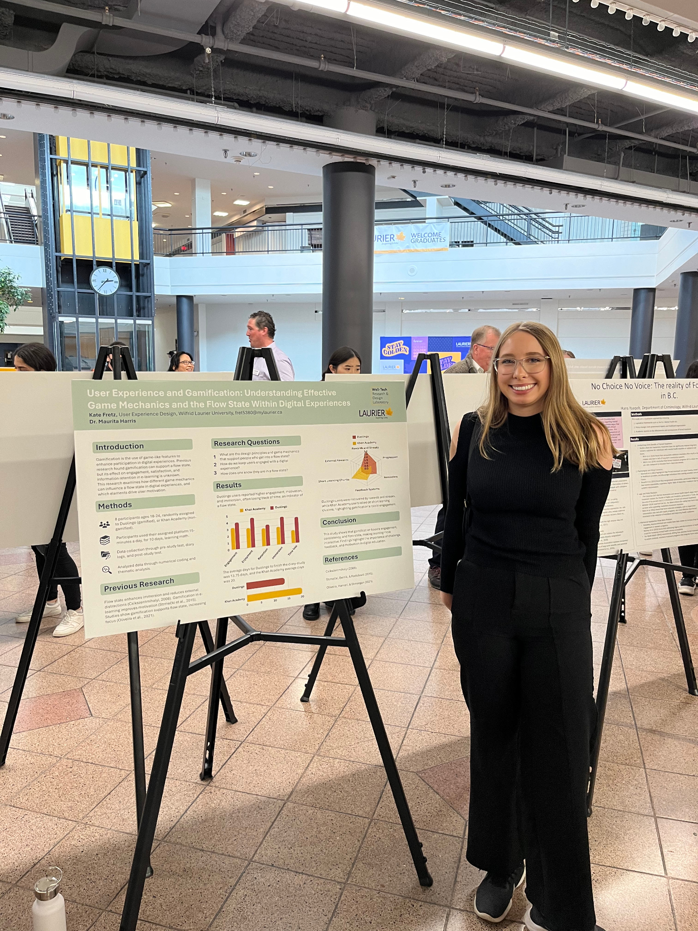 Kate Fretz presenting her gamification research poster at the ACERS showcase